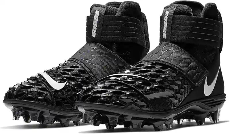 A pair of Nike High Top Football Cleats.