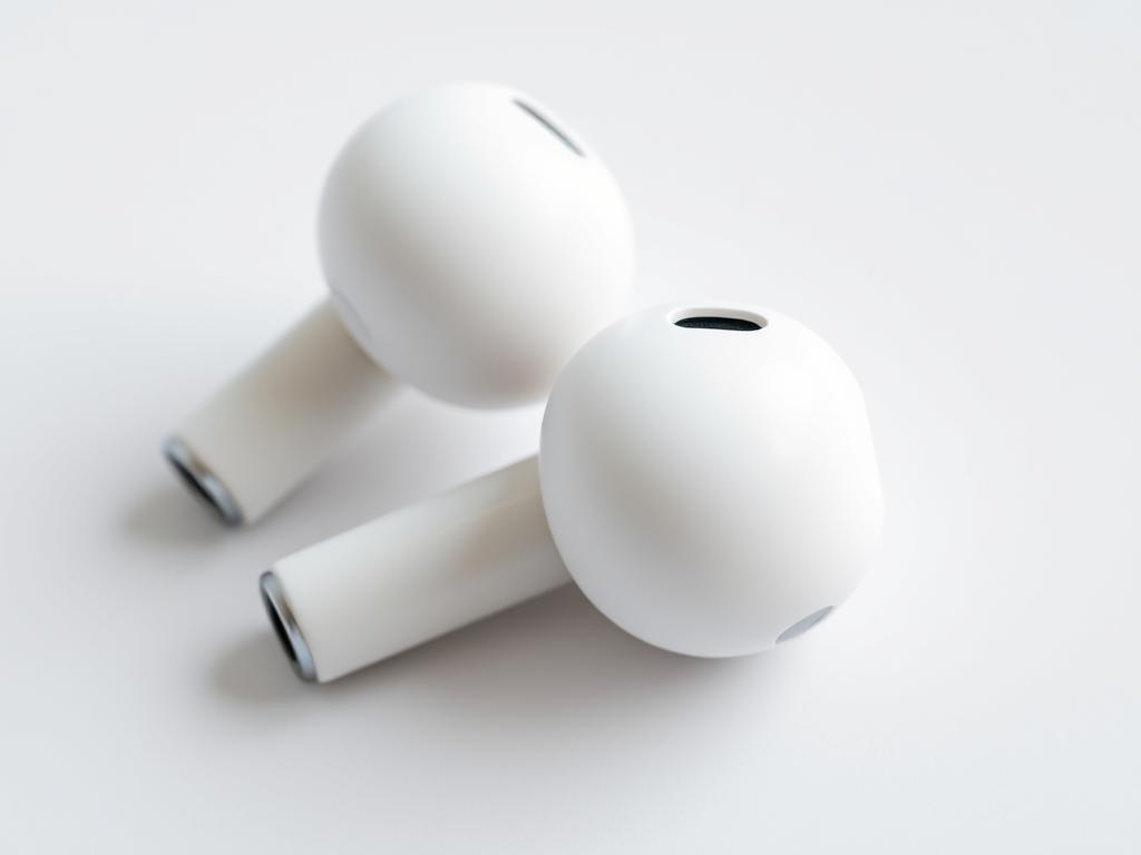 Apple AirPods Pro earbuds showing the stem design and silicone tips